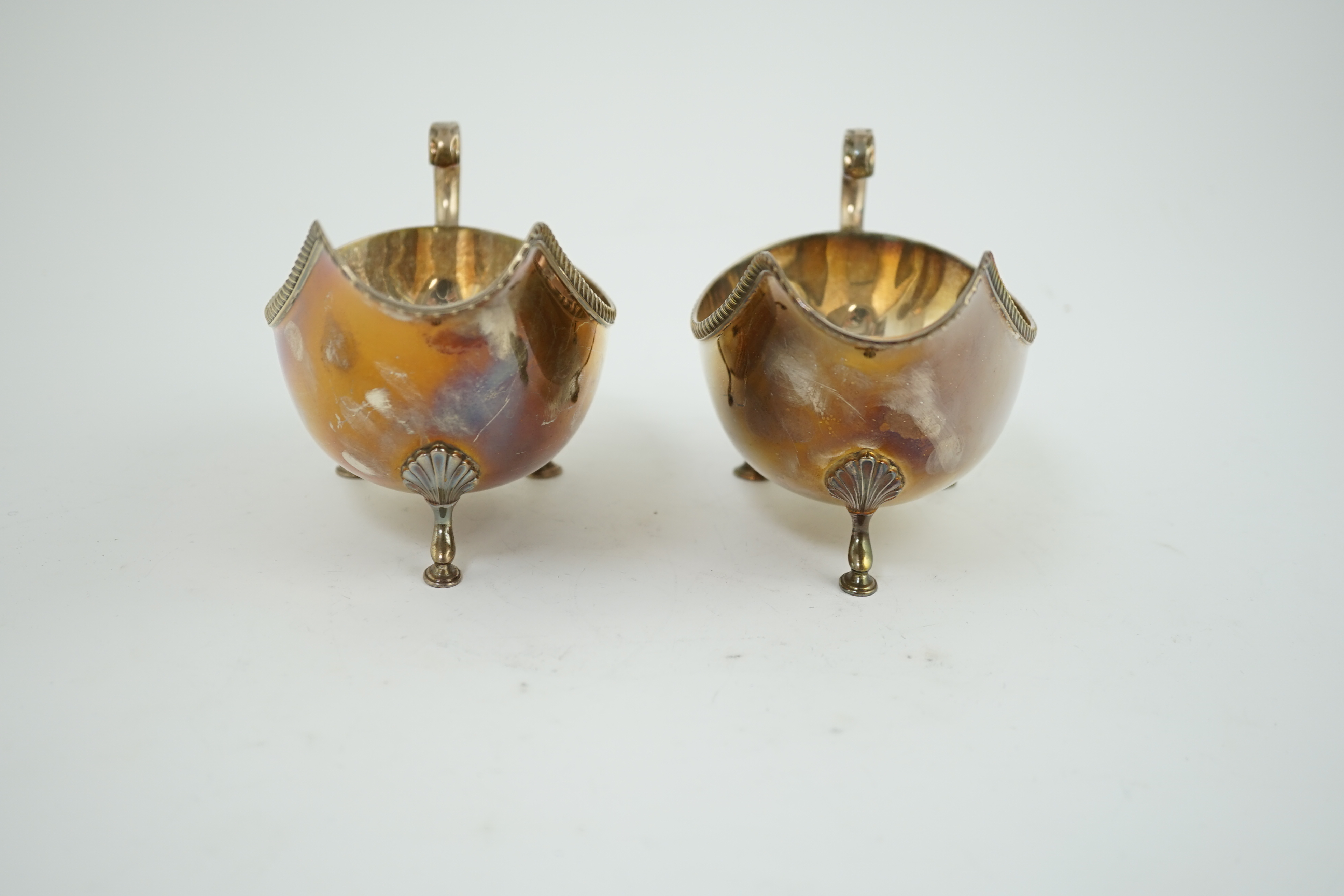 A pair of Elizabeth II silver sauce boats, by Barker Brothers Silver Ltd